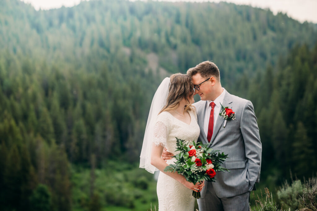 Island Park Summer wedding mountains Idaho photographer red roses 