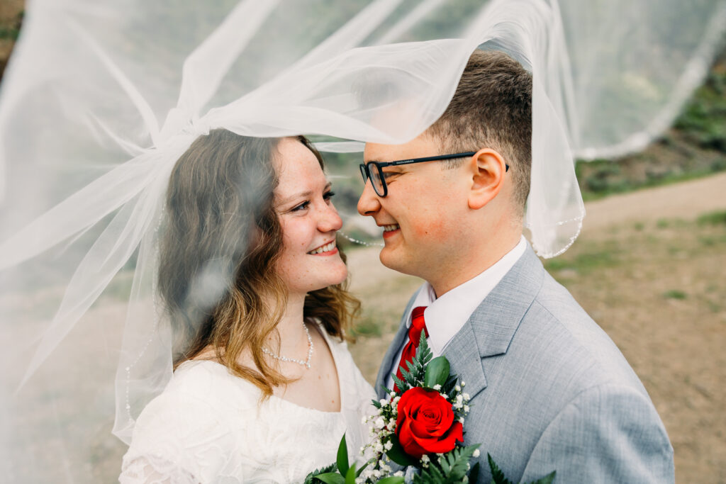 Idaho Falls Wedding Elopement Photographer summer mountain sunset with lace gowns from Margene's