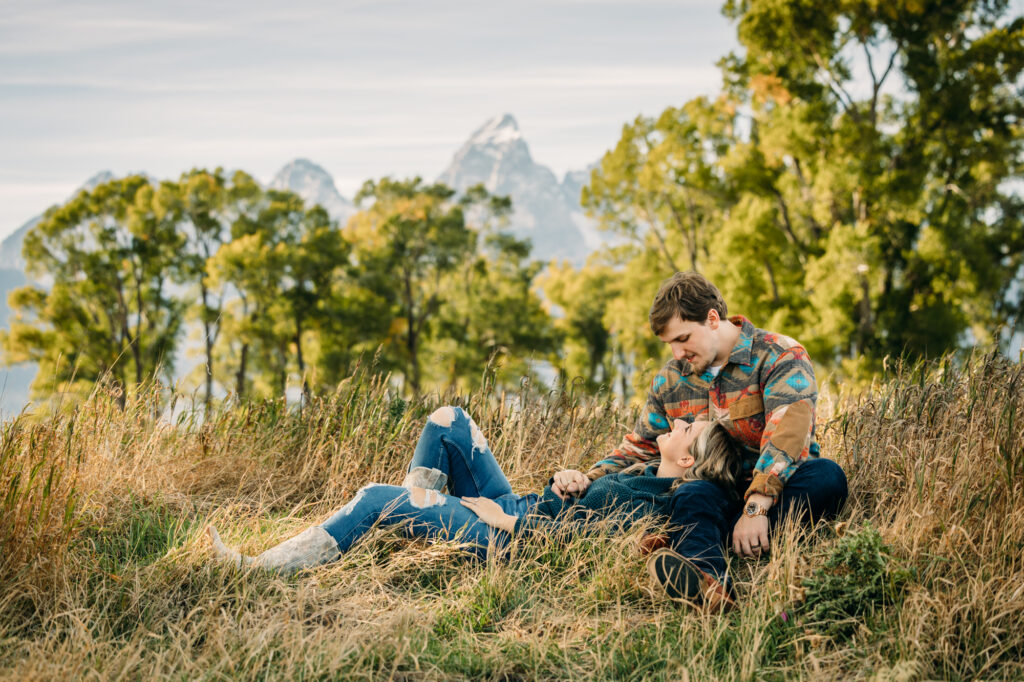 Mormon Row couple portraits engagements June tall grass T.A. Moulton Barn Grand Teton National park