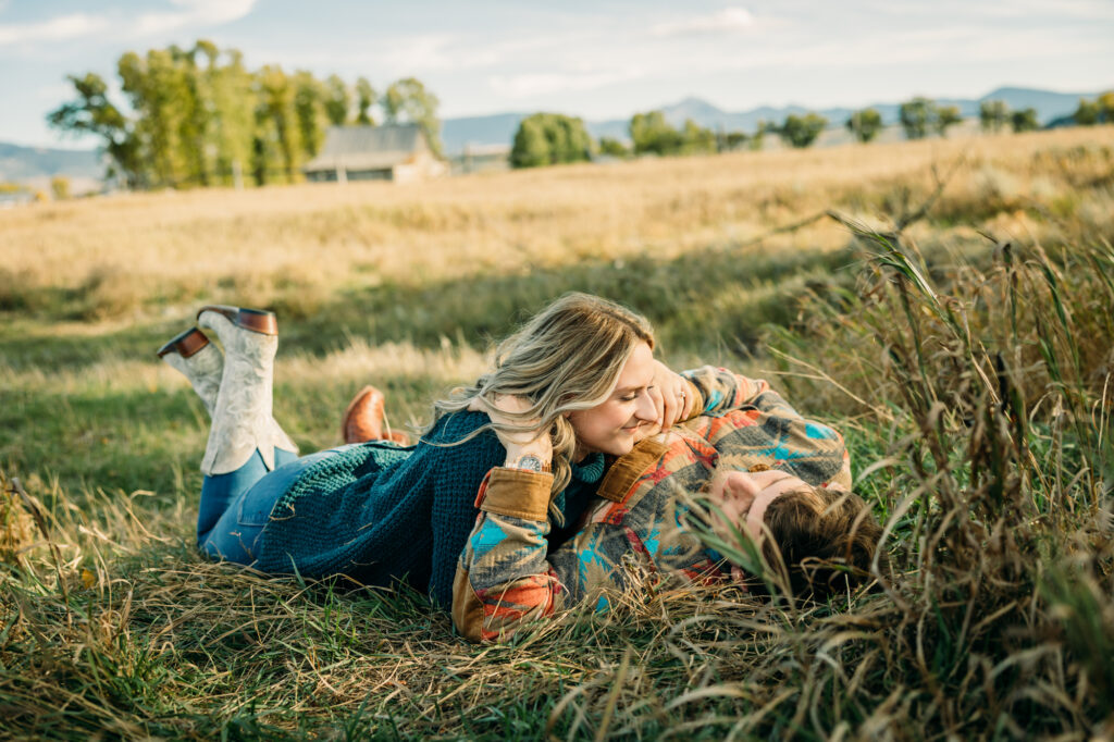 Mormon Row couple portraits engagements June tall grass T.A. Moulton Barn Grand Teton National park