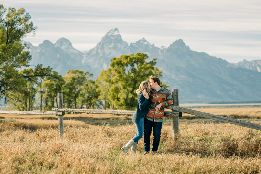 Mormon Row couple portraits engagements June tall grass T.A. Moulton Barn Grand Teton National park