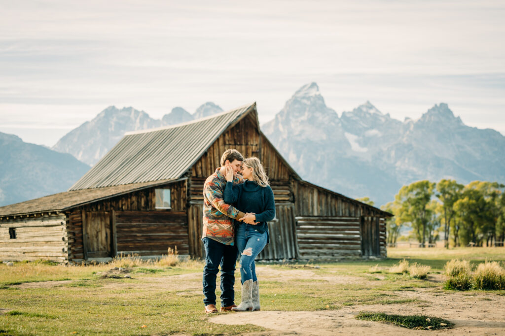 Mormon Row couple portraits engagements June tall grass T.A. Moulton Barn Grand Teton National park