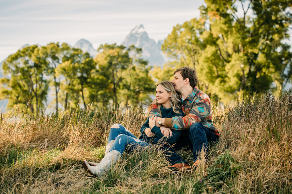 Mormon Row couple portraits engagements June tall grass T.A. Moulton Barn Grand Teton National park