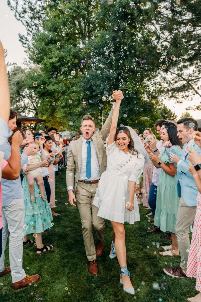 Idaho Falls backyard wedding reception vintage floral inspired beautiful bubble exit