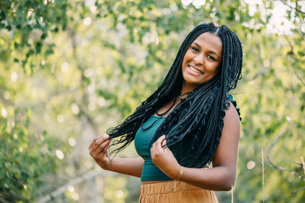 Swan Valley and Idaho Falls Highschool Senior session with mountains and horses