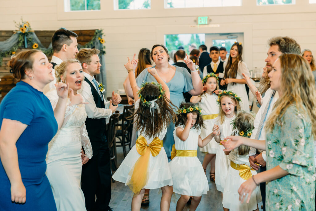Summer Sunflower inspired Idaho Falls LDS Temple Wedding with reception at Barn on 1st