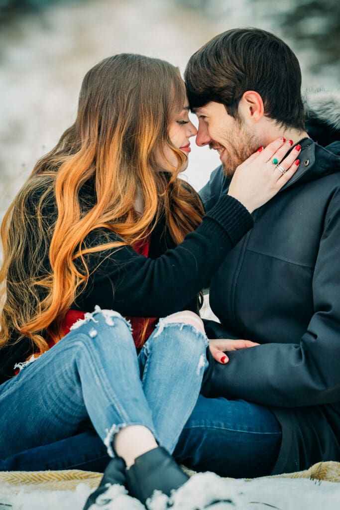 Romantic couple in snow in Island Park