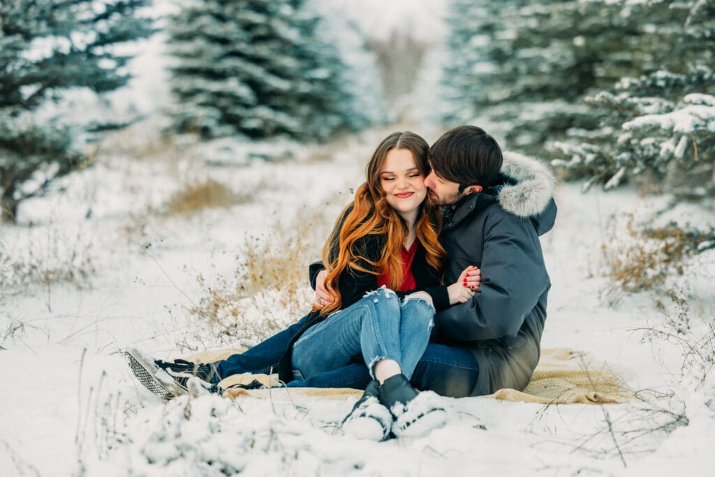 Romantic couple in snow in Island Park