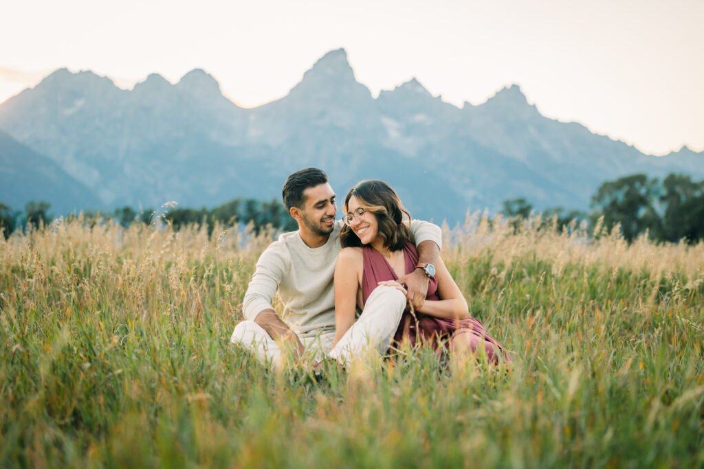 Couple Poses for Grand Teton Engagement Photo Session, playful couple in Cascade Canyon