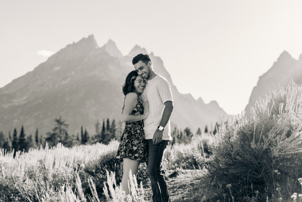 Couple Poses for Grand Teton Engagement Photo Session, playful couple in Cascade Canyon