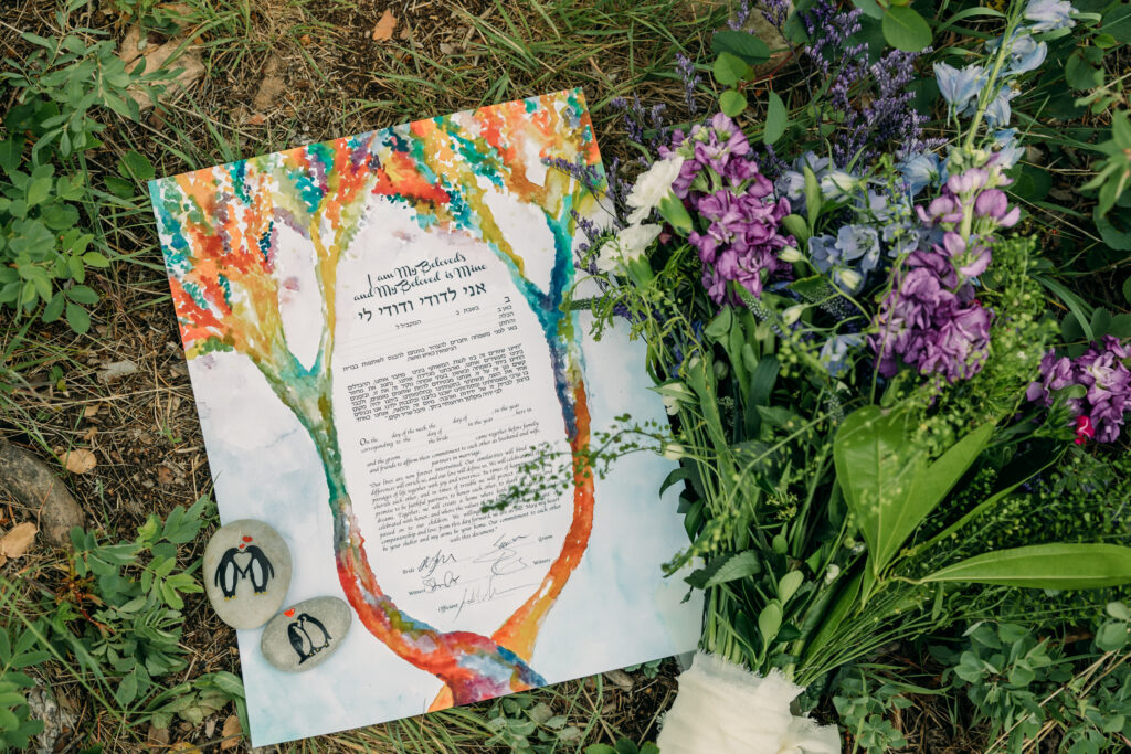 Bride and groom exchanging vows beneath The Wedding Tree overlooking the Tetons in Grand Teton National Park