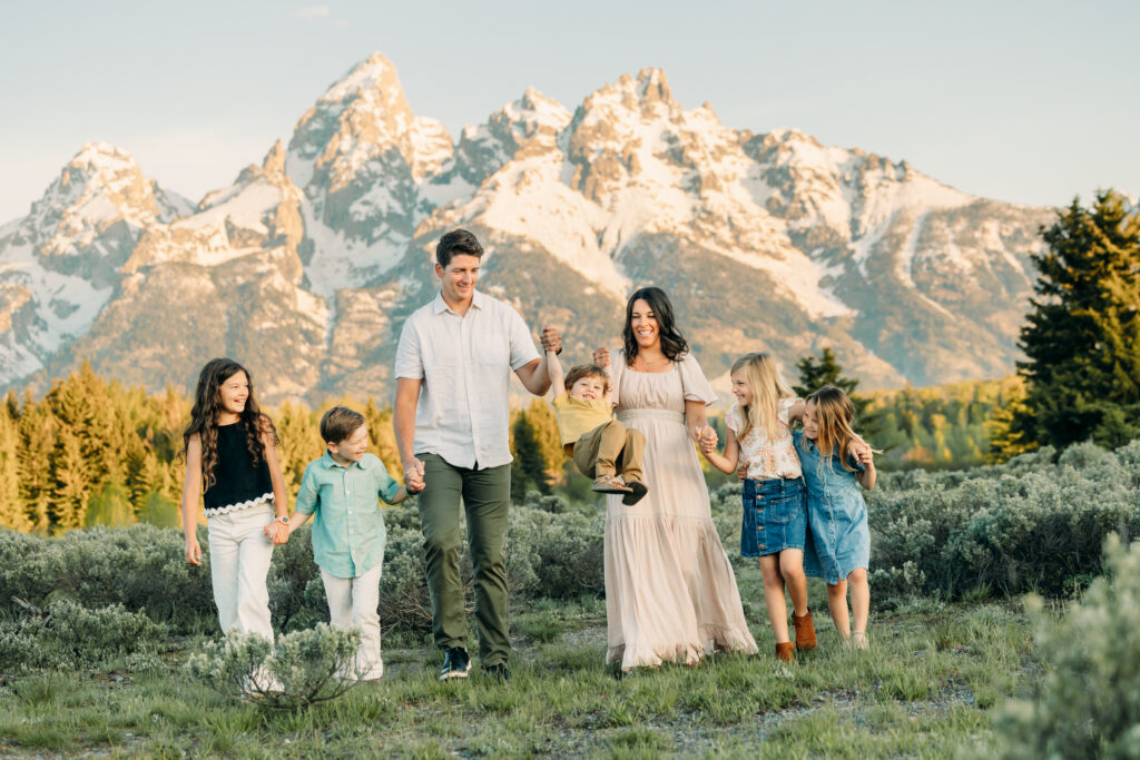 Grand teton family photographer tickling fight