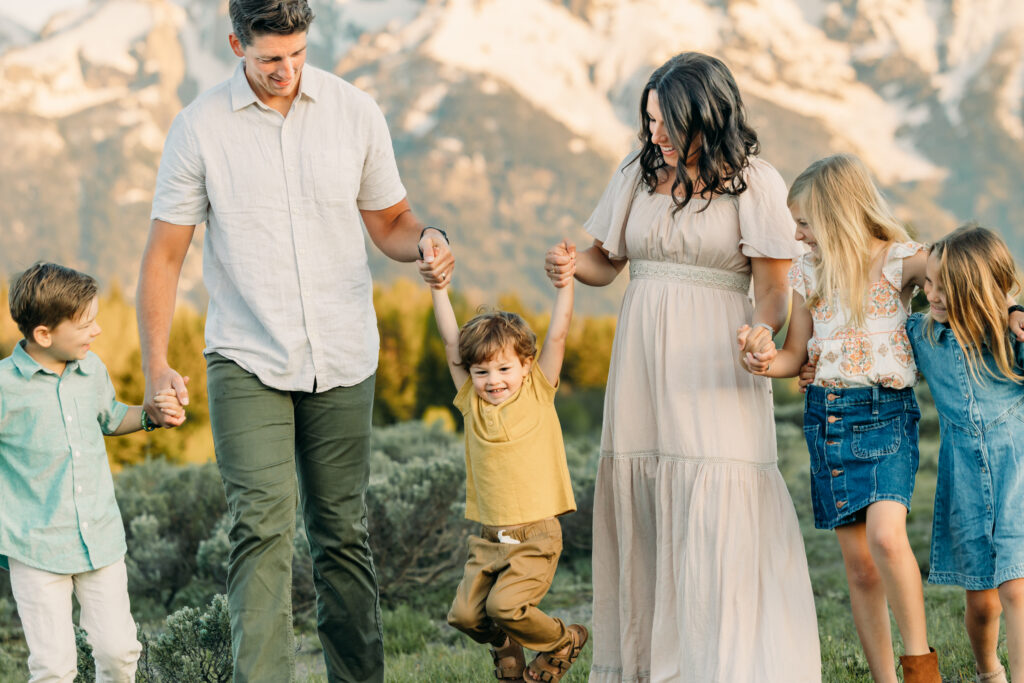 Grand teton family photographer tickling fight