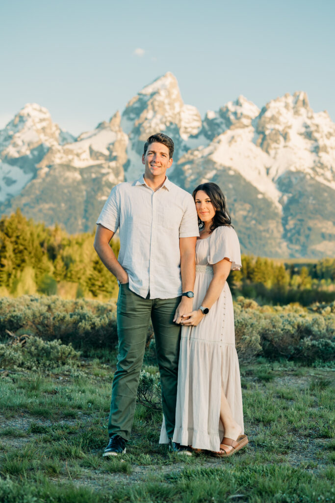 Grand teton family photographer couple together sunrise session schwabacher's landing