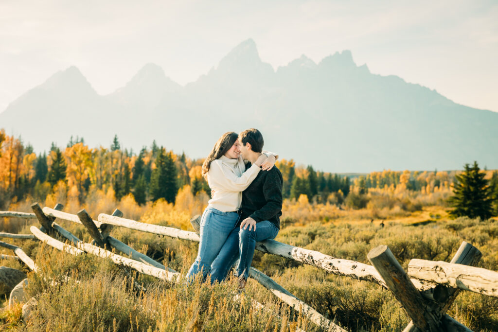 Grand Teton Photo Location Guide Schwabachers Landing in the fall couple with fence