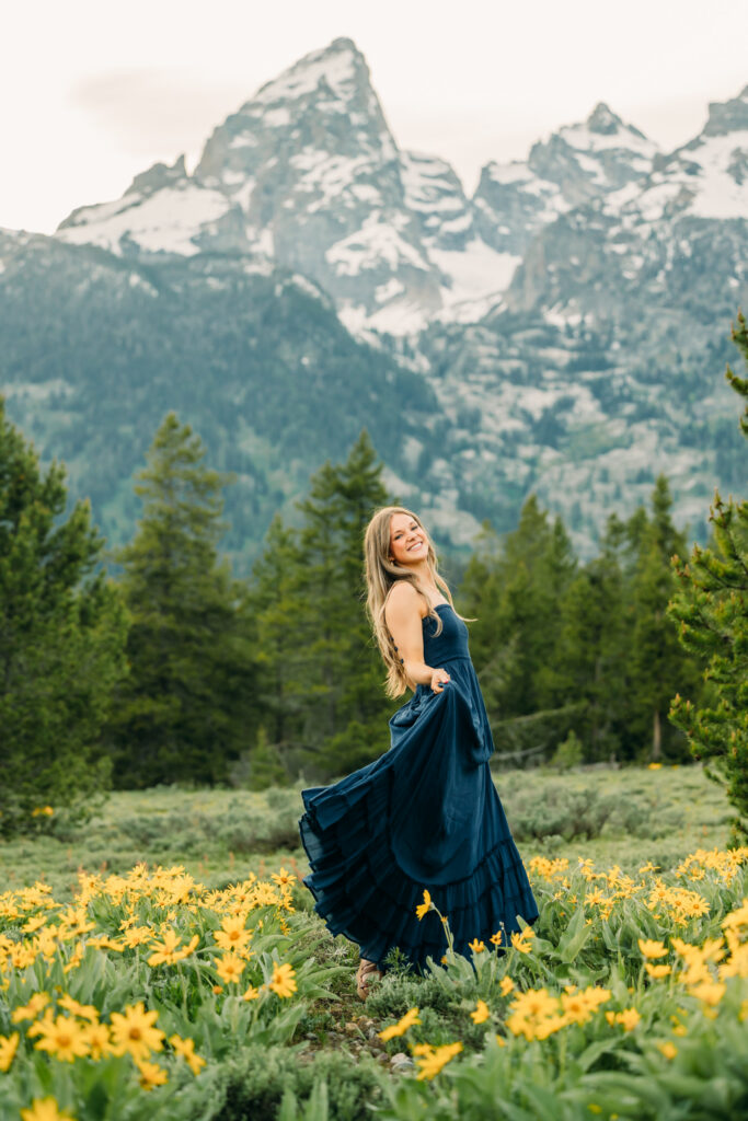 Sunset family photos with the Teton mountains in Grand Teton National Park in June with the sunflowers