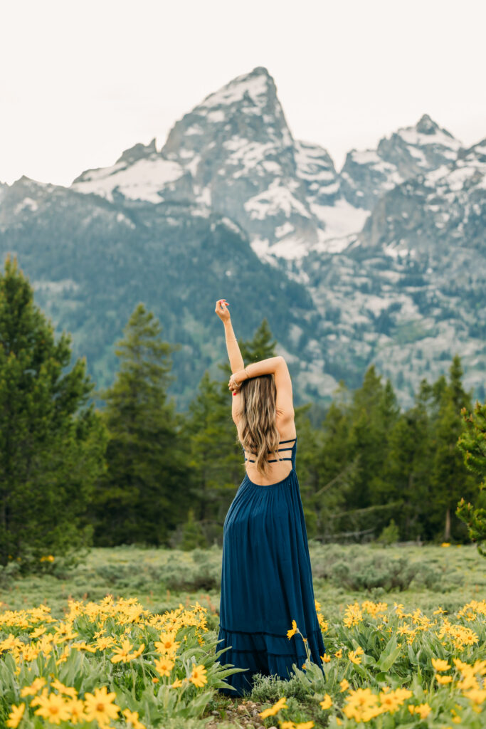 Sunset family photos with the Teton mountains in Grand Teton National Park in June with the sunflowers
