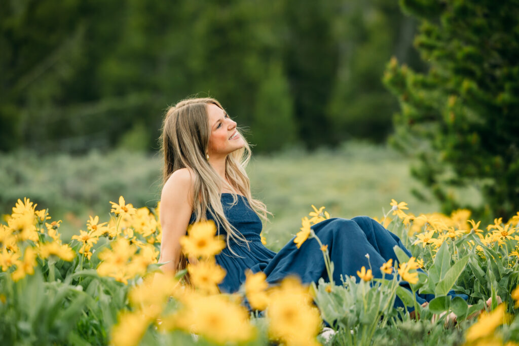 Sunset family photos with the Teton mountains in Grand Teton National Park in June with the sunflowers