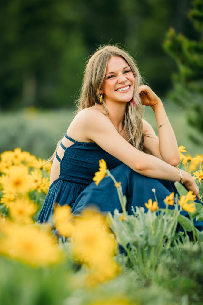 Sunset family photos with the Teton mountains in Grand Teton National Park in June with the sunflowers