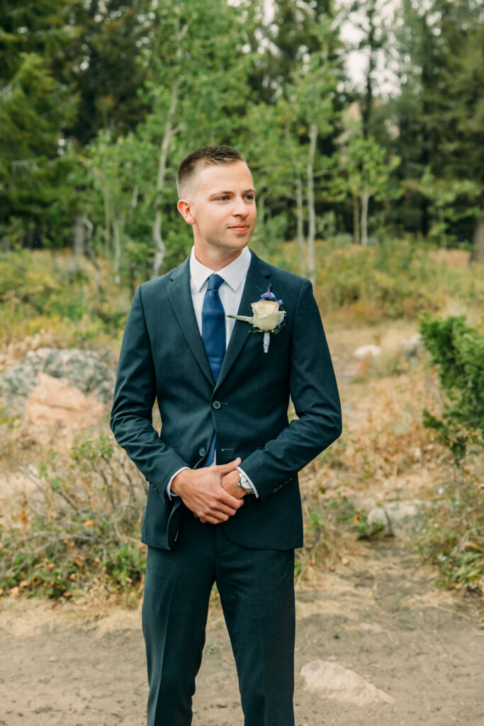 Eloping couple with the Teton mountain range in Grand Teton National Park