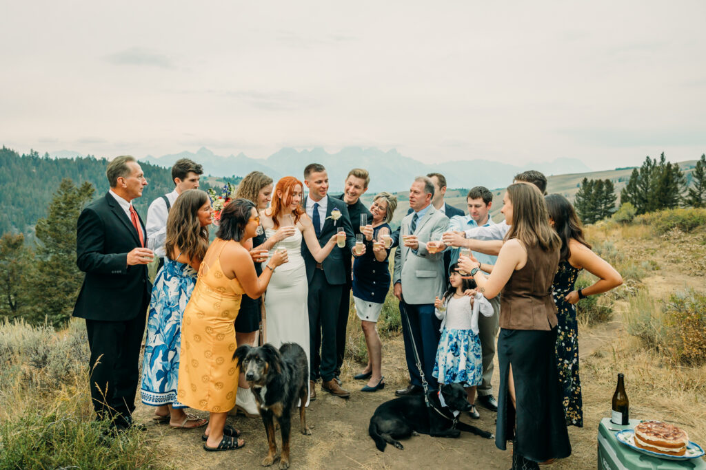 Eloping couple with the Teton mountain range in Grand Teton National Park
