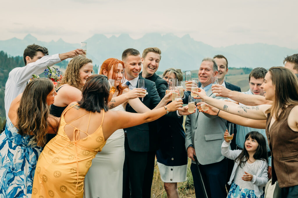 Eloping couple with the Teton mountain range in Grand Teton National Park