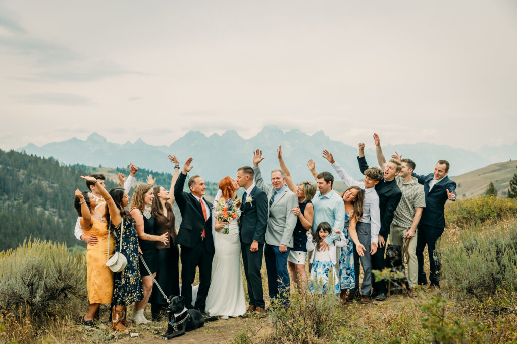 Eloping couple with the Teton mountain range in Grand Teton National Park