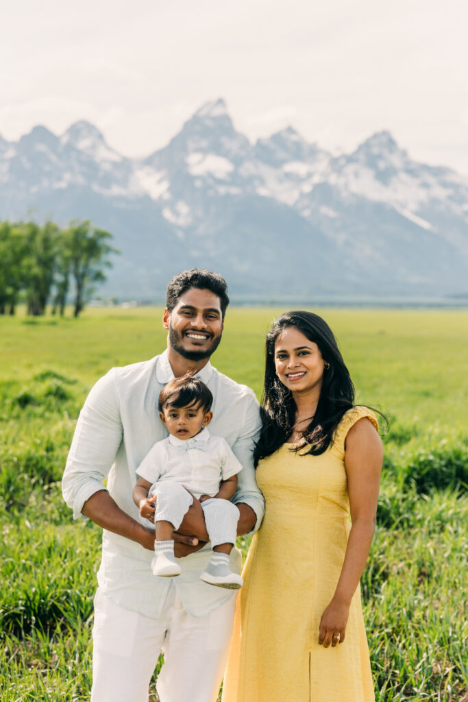 Parents laughing with their children during a Grand Teton National Park family photo session