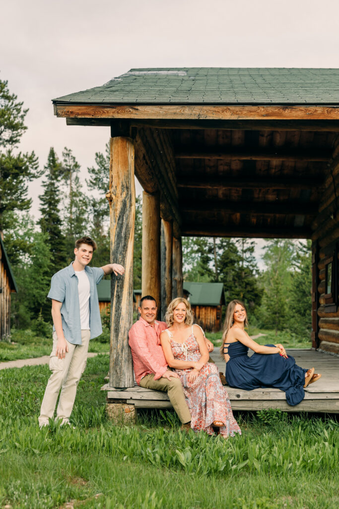 Sunset family photos with the Teton mountains in Grand Teton National Park in June with the sunflowers