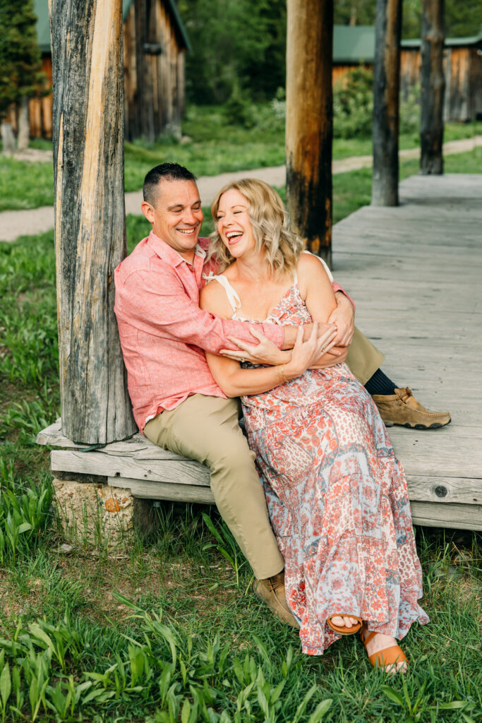 Sunset family photos with the Teton mountains in Grand Teton National Park in June with the sunflowers