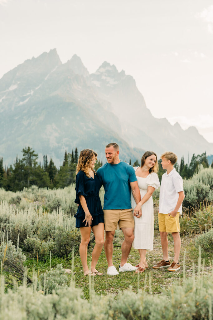 Family laughing together during a Jackson Hole family photography session