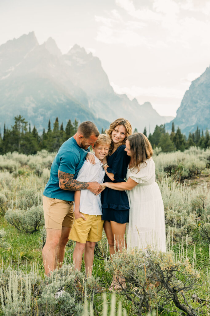 Family laughing together during a Jackson Hole family photography session