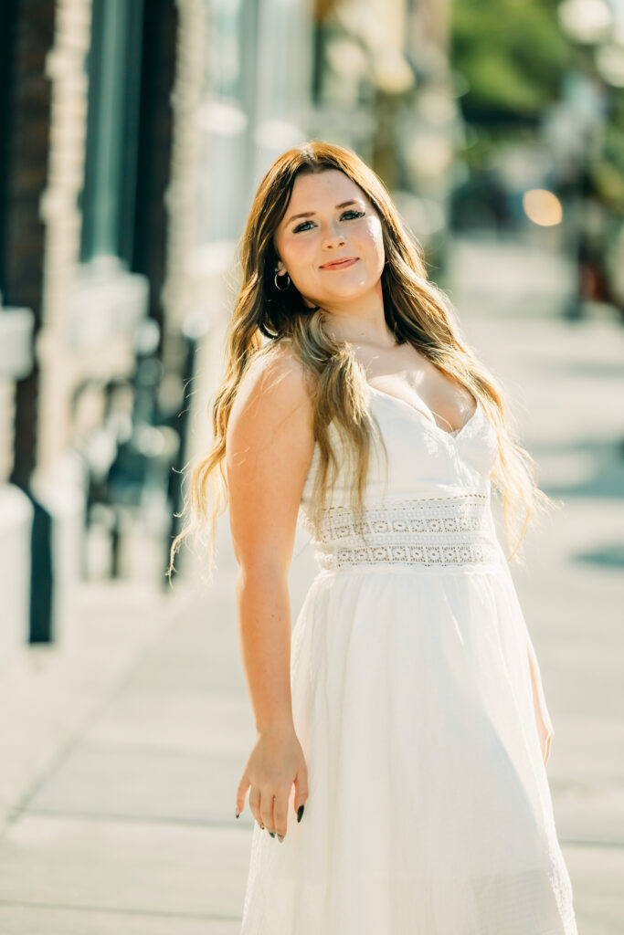 Rustic western senior photos with the Tetons in Wyoming