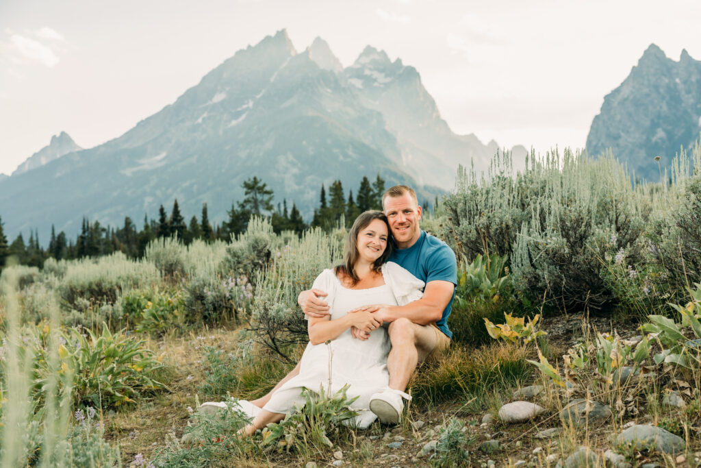 Kids running through grass during a Grand Teton family photography session