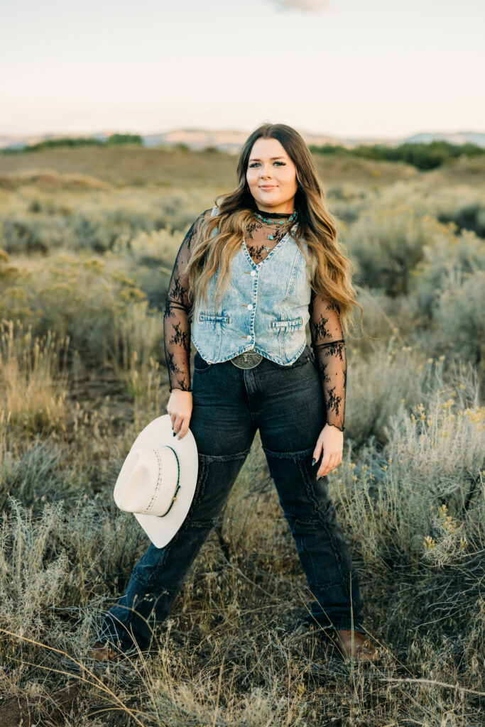 Western senior portrait with mountains and natural light in Jackson Hole with western jewelry