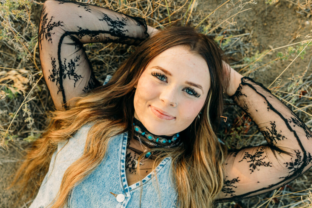 Western senior portrait with mountains and natural light in Jackson Hole with western jewelry