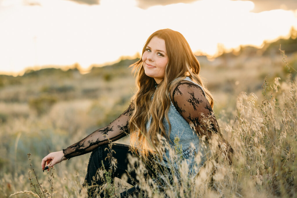 Western-inspired senior photos in Jackson Hole with mountain backdrop