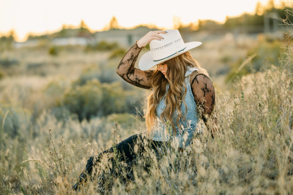 Western-inspired senior photos in Jackson Hole with mountain backdrop