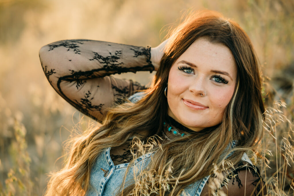 High school senior wearing a cowboy hat during a Jackson Hole senior photography session