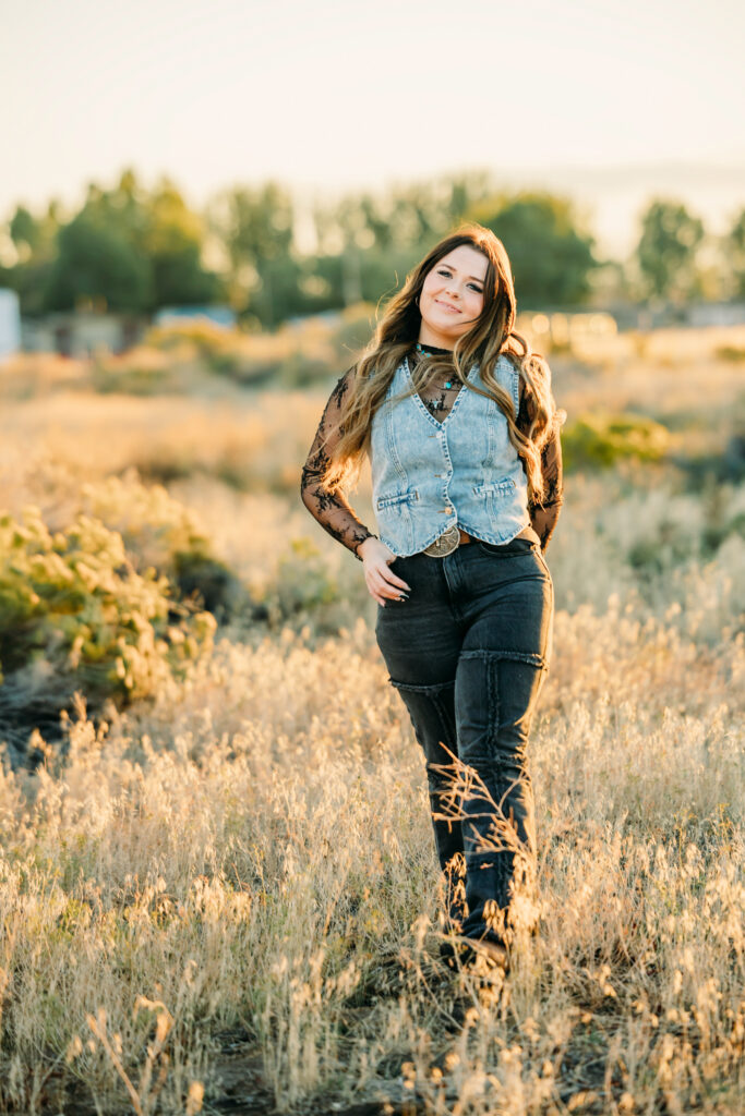 High school senior wearing a cowboy hat during a Jackson Hole senior photography session
