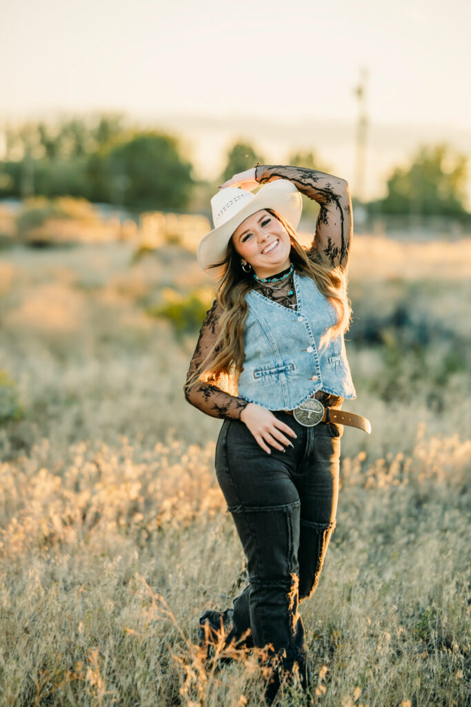 High school senior wearing a cowboy hat during a Jackson Hole senior photography session