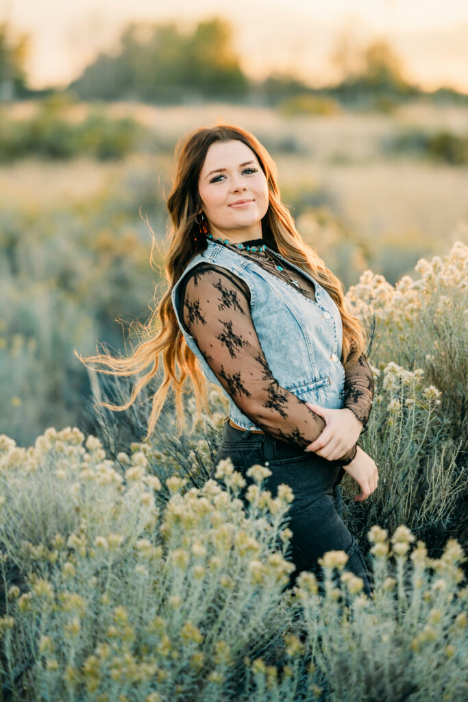 High school senior wearing a cowboy hat during a Jackson Hole senior photography session