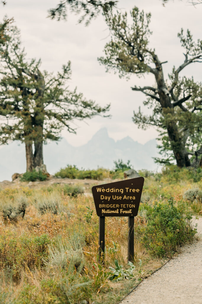 Adventure elopement photos with dramatic Teton mountains in Wyoming