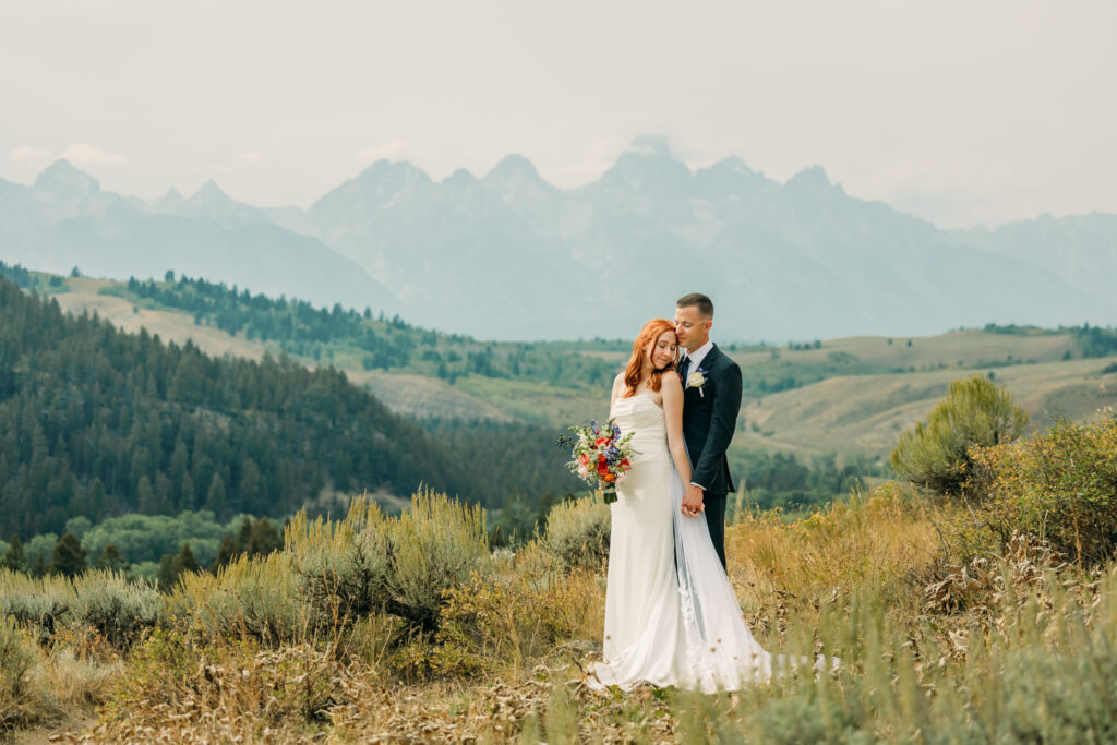 Bride and groom celebrating their intimate mountain wedding in Grand Teton National Park