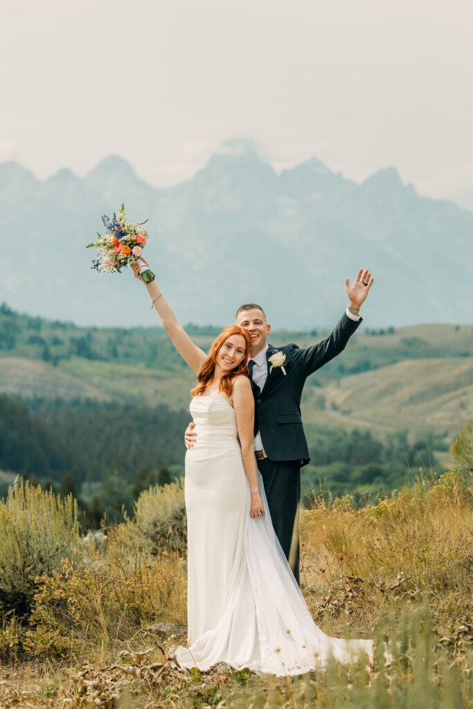 Bride and groom celebrating their intimate mountain wedding in Grand Teton National Park