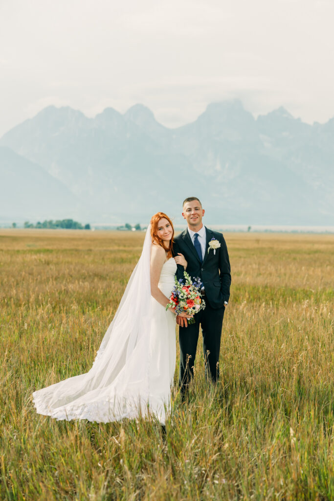 Bride and groom celebrating their intimate mountain wedding in Grand Teton National Park