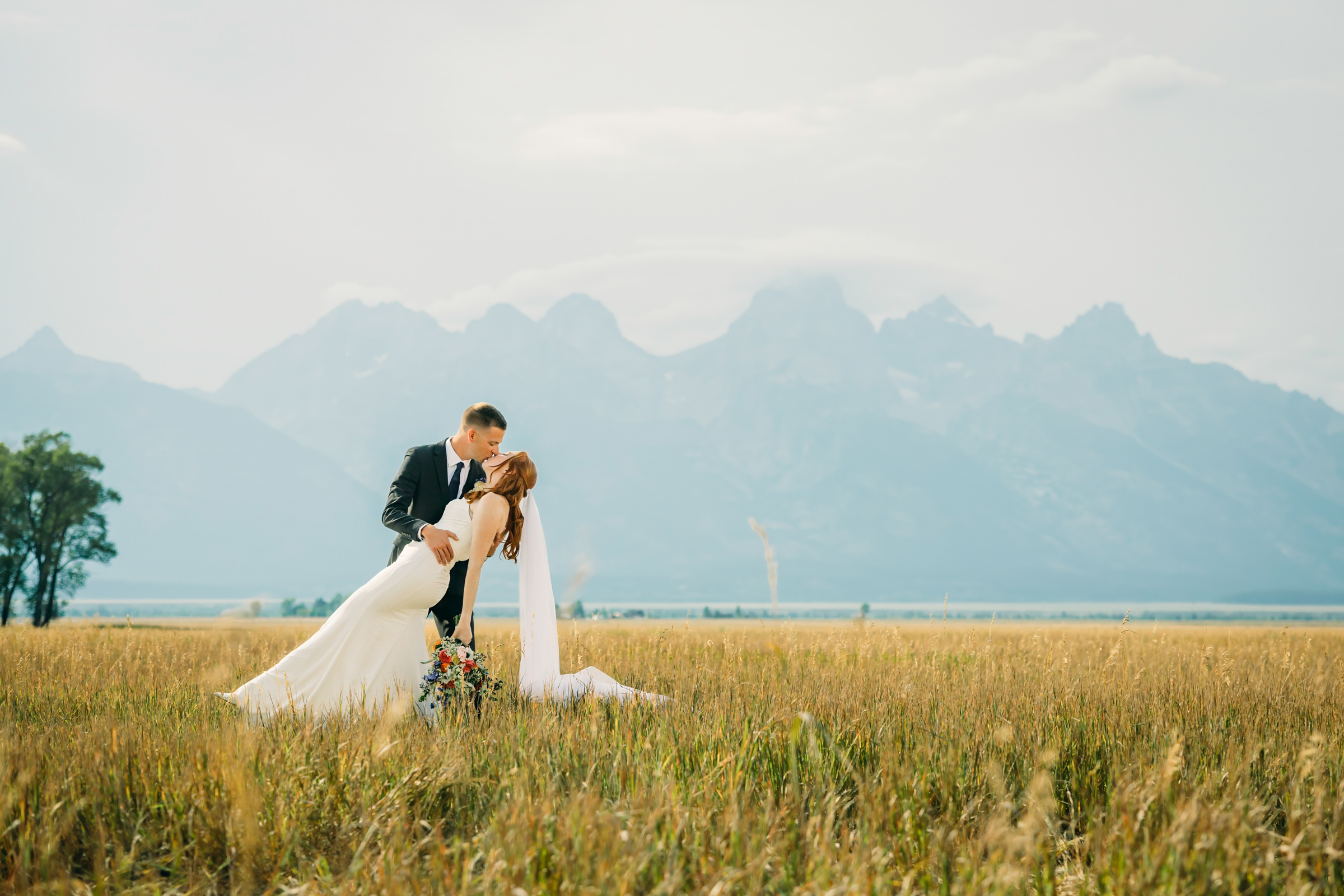 Bride and groom celebrating their intimate mountain wedding in Grand Teton National Park