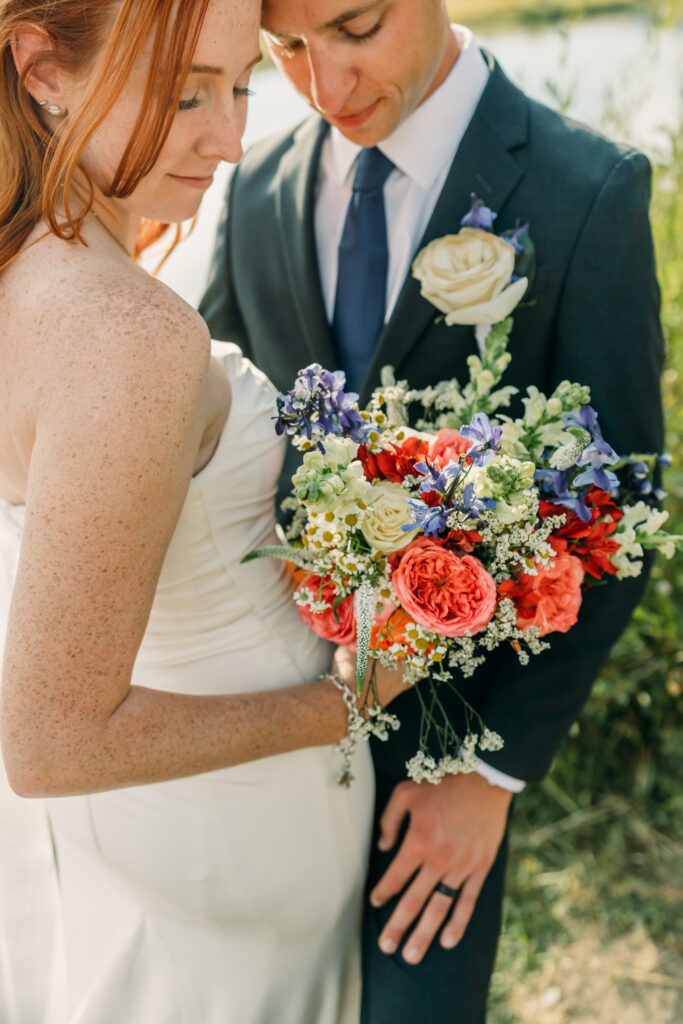 Eloping couple with the Teton mountain range in Grand Teton National Park