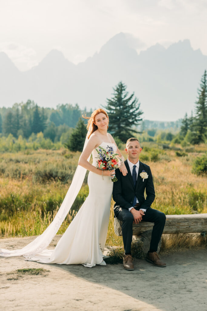 Eloping couple with the Teton mountain range in Grand Teton National Park