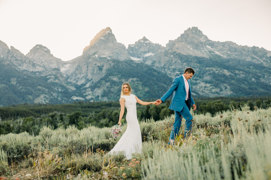 Top 5 best locations for taking photos in Grand Teton National Park Teton Glacier Turnout bride and groom at sunset